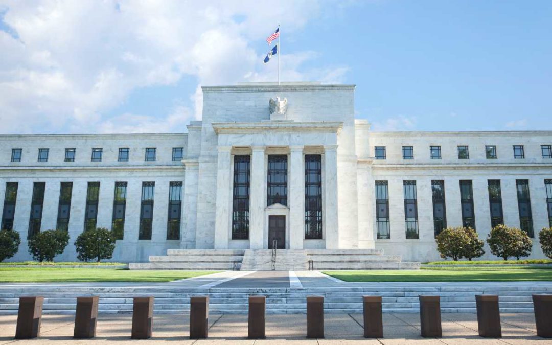 Federal Reserve building representing interest rate policy and economic impact